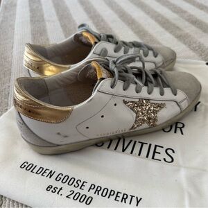 Golden Goose Women's Supestars Sneakers White and Gold with Gold sole design